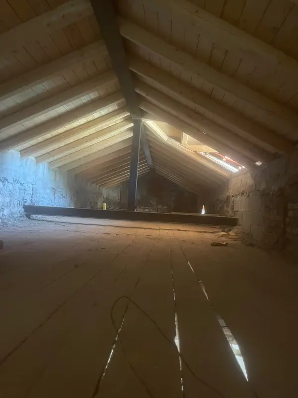 Sottotetto con nuova struttura in legno e acciaio – lavori Edil Driza